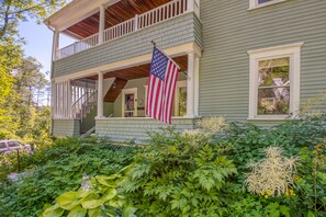 Enjoy the 2nd floor porch overlooking the perennial garden