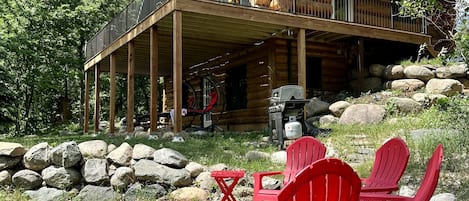 View of cabin with *new* wraparound deck, fire pit and propane grill