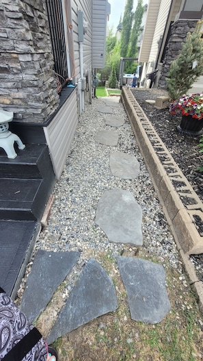 Stone and gravel pathway down to lower level 