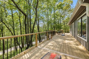 Challenge your friends to a game of cornhole on the elevated deck