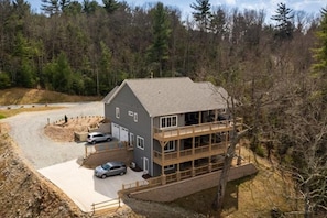 View of the entire home, parking for rental is the paved area.