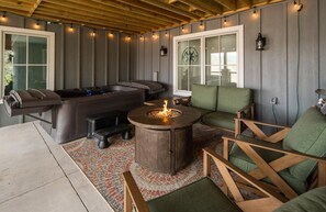 Private outdoor patio, including fire pit, hot tub and gas grill.