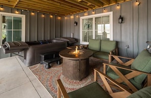 Private outdoor patio, including fire pit, hot tub and gas grill.