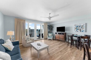 Living Area with Private Balcony Access, Ocean Views, Flat Screen TV and Sleeper Sofa