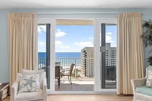 Living Area with Private Balcony Access, Ocean Views, Flat Screen TV and Sleeper Sofa