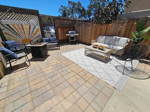 "Dream backyard: spacious, cozy fire pit, large grill, perfect for family fun!"