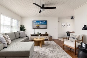 Living room with 65" smart TV to stream any of your subscription services.