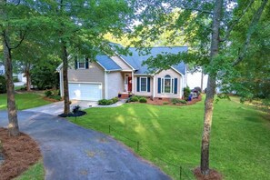 The circular drive provides ample parking space & ease of access for guests.