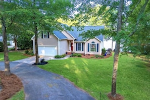 The circular drive provides ample parking space & ease of access for guests.