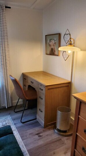 Private corner work desk in master bedroom.