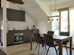 Table, Furniture, Cabinetry, Countertop, Chair, Building, Wood, Kitchen, Flooring, Interior Design