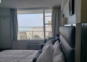 Queen Bed looking out the window