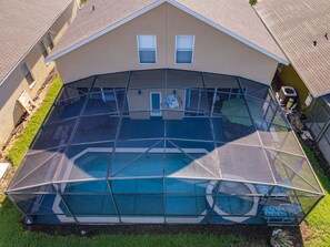 Overhead view of the private pool, spa, and patio area.