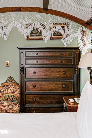 Large vintage dresser with several slide out drawers.
