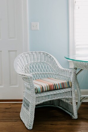 Enjoy a peaceful morning sitting at the room's two person table.