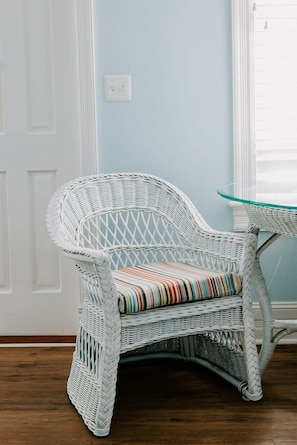 Enjoy a peaceful morning sitting at the room's two person table.