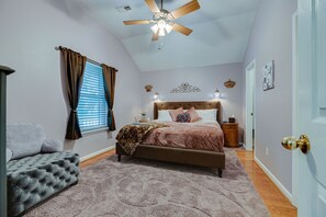 Mauve Royal Room has plush King bed, luxury linens and romantic lighting