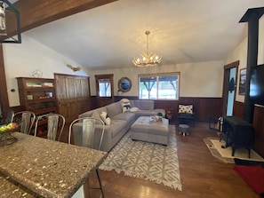 Looking from the kitchen nook into the cozy family room.