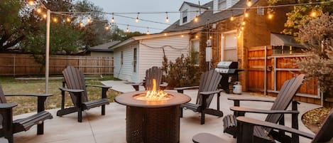 Enjoy a relaxing evening under the lights by the fire pit!
