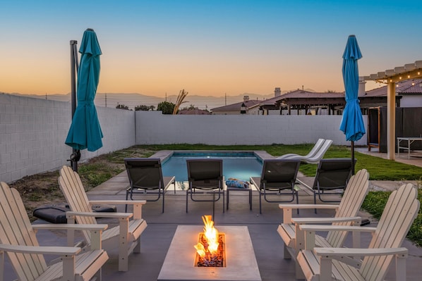 Sunset, firepit and night swimming in the desert is a must on the bucket list.