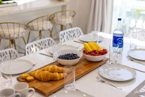 Breakfast and dinner in the dining room - seats 10, seats 4+ at breakfast bar

