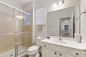 Large bathroom with a walk-in shower