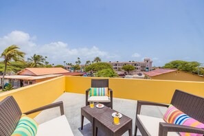 You'll love spending time on the private balcony with an overview of Palm Beach