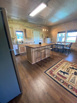 Entrance from Front Porch - Kitchen & Dining Area 