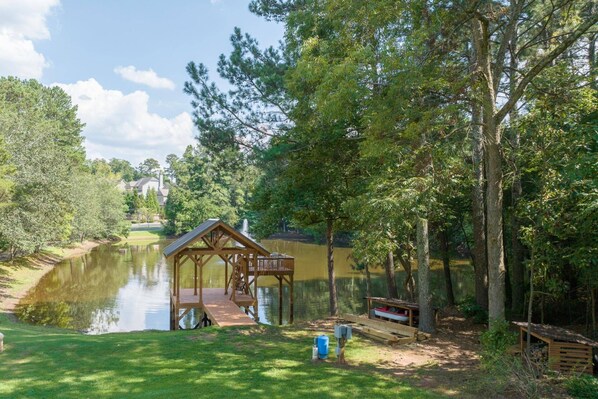 Grab some iced tea and relax on the dual level gazebo/dock.  The paddle-boat is really fun too!