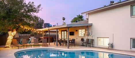 This backyard is a treat in itself! wide open spaces and a pool to keep you cool on those hot days!