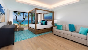 Primary Bedroom with King canopy bed and queen sleeper sofa, great for families