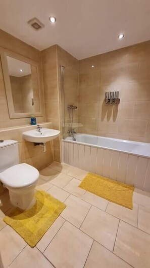 Fully tiled and equipped bathroom