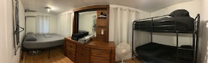 Pano pic of the long bedroom. There are 2 doors that lead into living room.