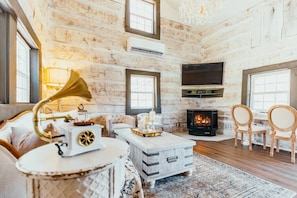 Living room with smart tv and propane fireplace