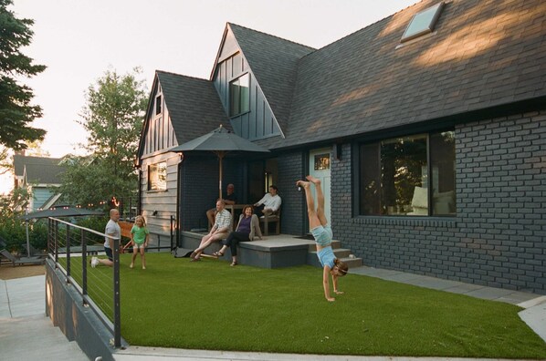 Plenty of room to play! Our spacious front yard offers endless fun—perfect for cartwheels and outdoor activities.