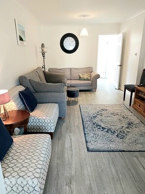 Living room leading to kitchen