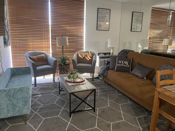 Lovely living room with sofa sleeper. 