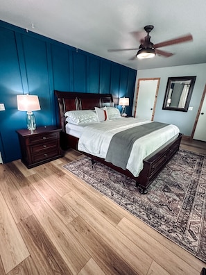 Main House King Bedroom- ceiling fan, walk in closet, room darkening curtains.