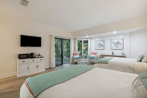2 Queen beds with highly rated mattress and a smart Tv