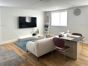 Living Room with 65" Cable TV