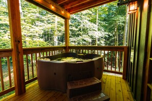 A jetted tub, just for two, sits right outside the bath's French doors