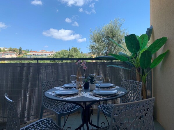 Table, Sky, Cloud, Furniture, Property, Plant, Flowerpot, Chair, Azure, Outdoor Table