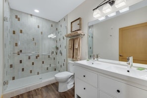 Complete with a double sink, oversized tile walk-in shower, towels, toiletries, and a hair dryer, you'll have everything you need. And if you need anything else, just let us know.