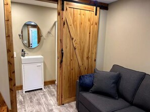 Barn door to washroom.