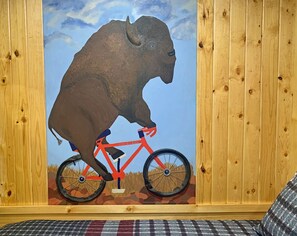 fun buffalo mural designed by our daughter in the Tour de Bison Cabin 