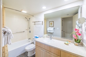 Full bathroom with bathtub and head shower