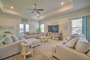 Living Room | Smart TV | Central A/C & Heat | Natural Light | Books