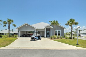 Property Exterior | Garage & Driveway Parking (3 Vehicles) | Community Amenities