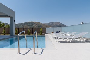 The pool terrace is equipped with high quality sun beds and umbrellas.