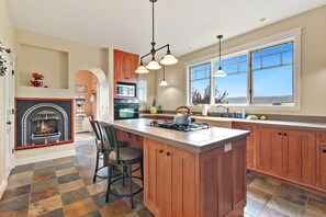 Chef's Kitchen with Large Island and Mountain Views